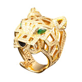 Goldfarbener Ring mit Leopardenkopf-Design besetzt mit Zirkonia und grüne - Siegelring-shop