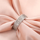 Ring mit arabischer Kalligraphie und Lotusblüten
