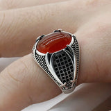 Männerring aus 925er Silber mit ovalem, weißem Stein und schwarze