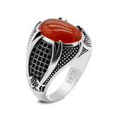 Männerring aus 925er Silber mit ovalem, weißem Stein und schwarze