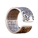 Ring aus 925er Silber mit facettiertem Drachenemblem