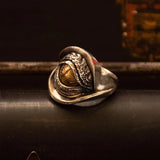 Drachenauge Ring aus Silber mit goldenem Emblem