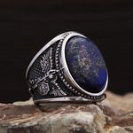 Men's ring with blue lapis lazuli and angel design in antique silver