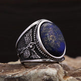 Men's ring with blue lapis lazuli and angel design in antique silver