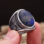 Men's ring with blue lapis lazuli and angel design in antique silver