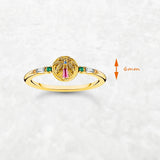 Golden ring with colorful palm tree emblem