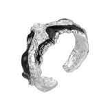 # Offener Ring für Männer und Frauen aus Edelstahl mit unregelmäßiger Lava-Struktur und verstellbarem Design in Schwarz und Silber