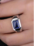 Men's ring made of 925 silver with large rectangular blue zirconia